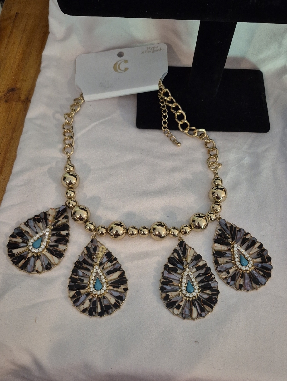 Gold Teardrop Statement Necklace with Turquoise Accents